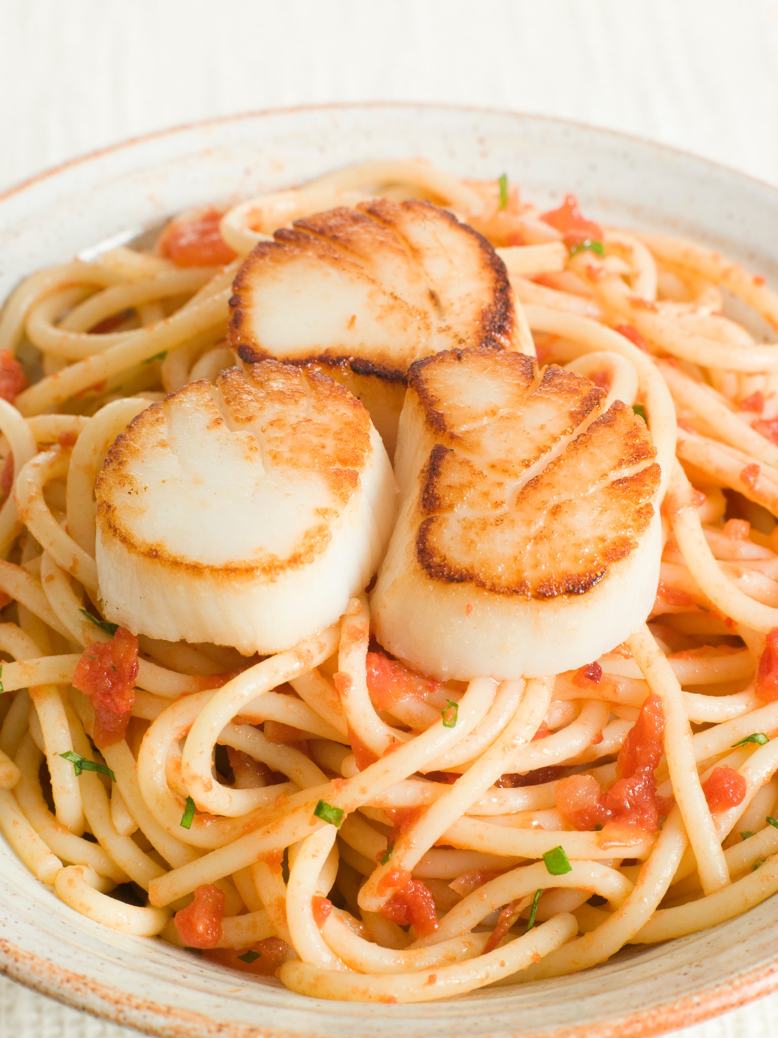 Seared Scallops with chilli and tomato spaghetti